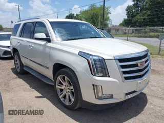 2015 Cadillac Escalade Luxury z VIN 1GYS4BKJ1FR215223, wystawiony jako IAAI lot #42548931 z przebiegiem 145 947 mil mil oraz . Historia ofert i sprzedaży dostępna na DreamBid. Obrazek 1.