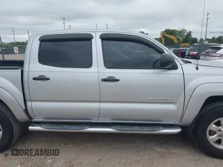 2007 Toyota Tacoma PreRunner z VIN 3TMJU62N37M033683, wystawiony jako IAAI lot #42383346 z przebiegiem 138 683 mil mil oraz . Historia ofert i sprzedaży dostępna na DreamBid. Obrazek 13.