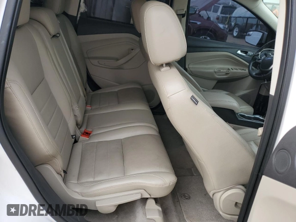 2014 Ford Escape Titanium с VIN 1FMCU0J93EUC35437, выставлен на аукционе Copart как лот 56299395 с пробегом 130 770 миль миль и Списание • Salvage title. История ставок и продаж доступна на DreamBid. Изображение 10.