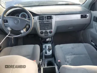 2006 Suzuki Forenza z VIN KL5JD56Z96K478173, wystawiony jako Copart lot #87059644 z przebiegiem 234 059 mil mil oraz Szkoda całkowita • Salvage title. Historia ofert i sprzedaży dostępna na DreamBid. Obrazek 8.