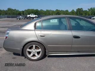 2005 Nissan Altima SE z VIN 1N4BL11D95N437079, wystawiony jako IAAI lot #42399612 z przebiegiem 296 135 mil mil oraz . Historia ofert i sprzedaży dostępna na DreamBid. Obrazek 13.