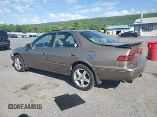 1999 Toyota Camry LE z VIN JT2BG22K0X0295893, wystawiony jako Copart lot #56183655 z przebiegiem 327 172 mil mil oraz Szkoda całkowita • Salvage title. Historia ofert i sprzedaży dostępna na DreamBid. Obrazek 2.