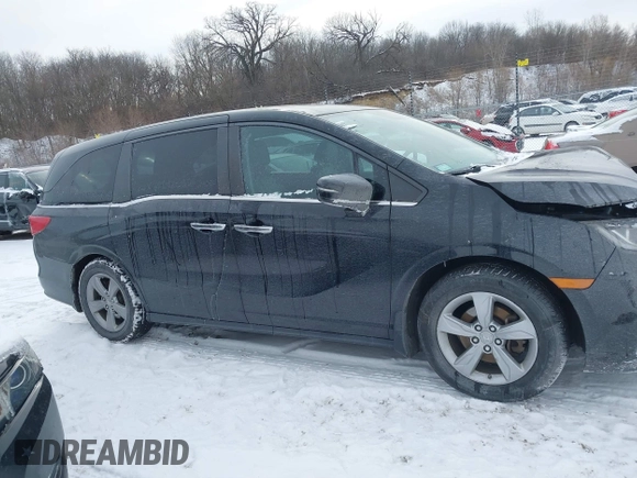 2018 Honda Odyssey EX-L z VIN 5FNRL6H79JB012735, wystawiony jako IAAI lot #41552799 z przebiegiem 29 253 mil mil oraz . Historia ofert i sprzedaży dostępna na DreamBid. Obrazek 13.