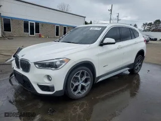 2017 BMW X1 xDrive28i with VIN WBXHT3C31H5F85452, listed as a Copart auction lot 50351125 with 61,954 mi miles and Salvage Title. Bid and sale history available at carsss.com. Image 1.