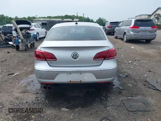 2014 Volkswagen CC Sport z VIN WVWBN7AN9EE524674, wystawiony jako IAAI lot #42252264 z przebiegiem 118 378 mil mil oraz . Historia ofert i sprzedaży dostępna na DreamBid. Obrazek 16.