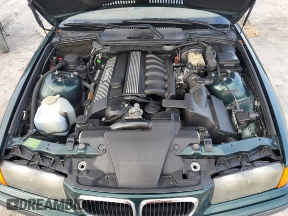 1999 BMW 3 Series z VIN WBABK8330XEY91814, wystawiony jako Copart lot #79799074 z przebiegiem 63 783 mil mil oraz Szkoda całkowita • Salvage title. Historia ofert i sprzedaży dostępna na DreamBid. Obrazek 11.