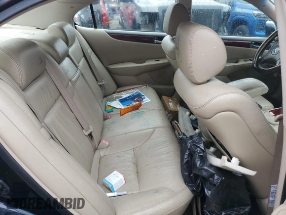 2003 Lexus ES 300 with VIN JTHBF30G036009951, listed as a Copart auction lot 50021235 with 231,411 mi miles and Salvage Title. Bid and sale history available at DreamBid. Image 10.