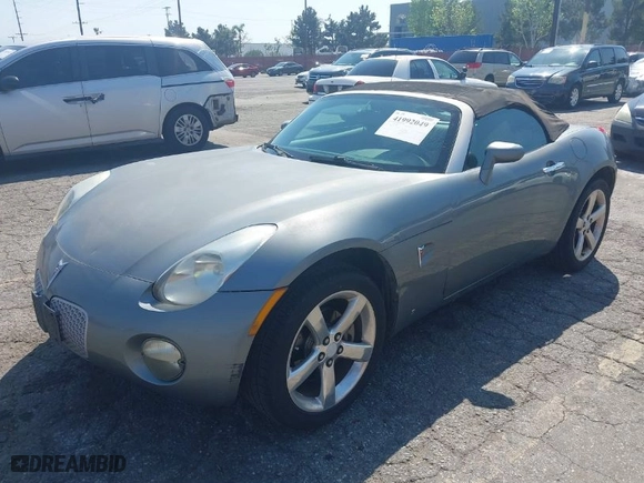 2007 Pontiac Solstice with VIN 1G2MB35B47Y114607, listed as a IAAI auction lot 41992049 with 127,702 mi miles. Bid and sale history available at carsss.com. Image 2.