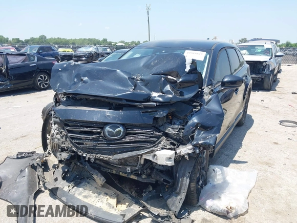 2021 Mazda CX-9 Touring with VIN JM3TCBCY8M0514905, listed as a IAAI auction lot 42385627 with 72,610 mi miles and . Bid and sale history available at DreamBid. Image 17.