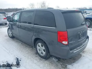 2018 Dodge Grand Caravan SXT with VIN 2C4RDGCG2JR325737, listed as a IAAI auction lot 41610173 with 97,492 mi miles. Bid and sale history available at carsss.com. Image 3.