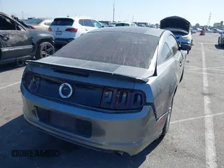 2014 Ford Mustang V6 with VIN 1ZVBP8AM9E5210284, listed as a IAAI auction lot 41957298 with 108,579 mi miles. Bid and sale history available at carsss.com. Image 4.