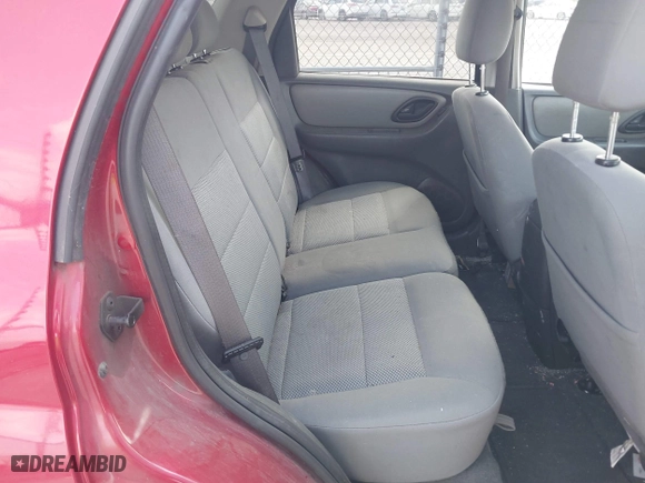 2006 Ford Escape XLT with VIN 1FMYU03116KB57637, listed as a IAAI auction lot 41803899 with 118,945 mi miles. Bid and sale history available at carsss.com. Image 8.