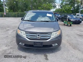 2013 Honda Odyssey Touring with VIN 5FNRL5H96DB068843, listed as a IAAI auction lot 42312176 with 115,804 mi miles and . Bid and sale history available at DreamBid. Image 13.
