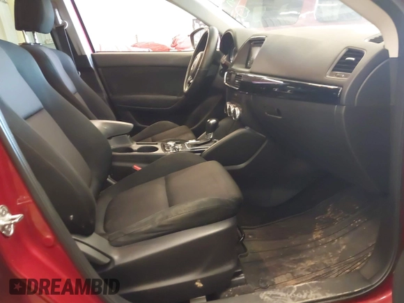 2016 Mazda CX-5 Sport z VIN JM3KE2BY3G0684861, wystawiony jako IAAI lot #42050897 z przebiegiem 165 688 mil mil oraz . Historia ofert i sprzedaży dostępna na DreamBid. Obrazek 5.