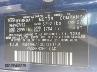 2013 Hyundai Elantra Coupe SE with VIN KMHDH6AE0DU010769, listed as a Copart auction lot 82054844 with 103,963 mi miles and Salvage Title. Bid and sale history available at carsss.com. Image 13.