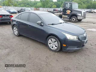 2014 Chevrolet Cruze LS with VIN 1G1PA5SG3E7319385, listed as a IAAI auction lot 42264380 with 124,525 mi miles and . Bid and sale history available at DreamBid. Image 1.