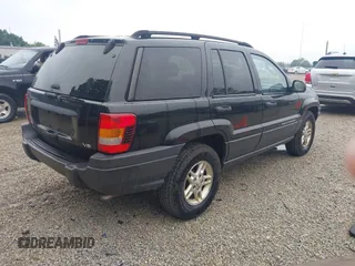 2003 Jeep Grand Cherokee Laredo with VIN 1J4GW48NX3C532874, listed as a IAAI auction lot 42613091 with 165,920 mi miles and . Bid and sale history available at DreamBid. Image 4.