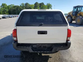 2021 Toyota Tacoma SR with VIN 3TYRX5GN6MT029026, listed as a Copart auction lot 54786755 with 105,315 mi miles and Salvage title. Bid and sale history available at DreamBid. Image 6.