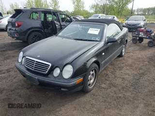 1999 Mercedes-Benz CLK with VIN WDBLK65G1XT013704, listed as a IAAI auction lot 42115880 with 85,741 mi miles. Bid and sale history available at carsss.com. Image 17.