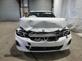 2025 BMW 3 Series 330i xDrive with VIN 3MW89CW02S8F00975, listed as a Copart auction lot 89027935 with 3,667 mi miles and Salvage Title. Bid and sale history available at carsss.com. Image 5.