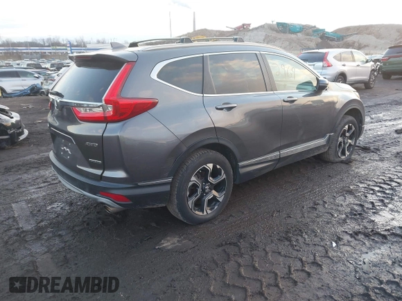 2017 Honda CR-V Touring with VIN 2HKRW2H94HH617081, listed as a IAAI auction lot 41294254 with 145,140 mi miles. Bid and sale history available at carsss.com. Image 4.