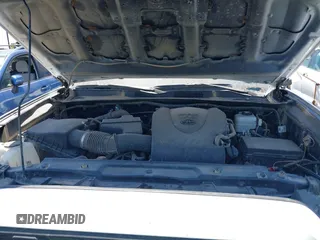 2023 Toyota Tacoma SR with VIN 3TMCZ5AN4PM558760, listed as a IAAI auction lot 42626514 with 39,335 mi miles and . Bid and sale history available at DreamBid. Image 10.