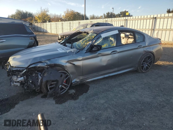 2021 BMW M5 with VIN WBS83CH0XMCH58055, listed as a Copart auction lot 79473464 with 0 mi miles and Salvage Title. Bid and sale history available at carsss.com. Image 1.