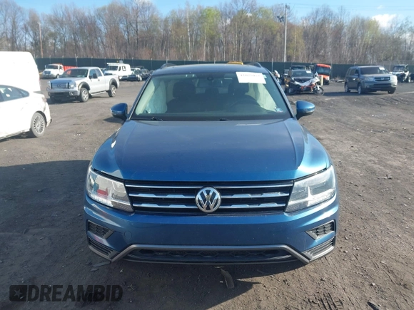 2020 Volkswagen Tiguan SE with VIN 3VV2B7AX2LM017277, listed as a IAAI auction lot 42075052 with 72,248 mi miles and . Bid and sale history available at DreamBid. Image 12.