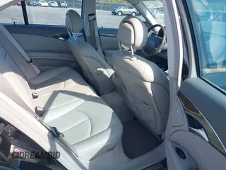 2003 Mercedes-Benz E-Class 3.2L with VIN WDBUF65J33A112308, listed as a IAAI auction lot 41871334 with 138,522 mi miles. Bid and sale history available at carsss.com. Image 8.