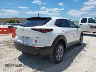 2021 Mazda CX-30 Select with VIN 3MVDMABL3MM232497, listed as a IAAI auction lot 42033929 with 33,050 mi miles. Bid and sale history available at carsss.com. Image 4.