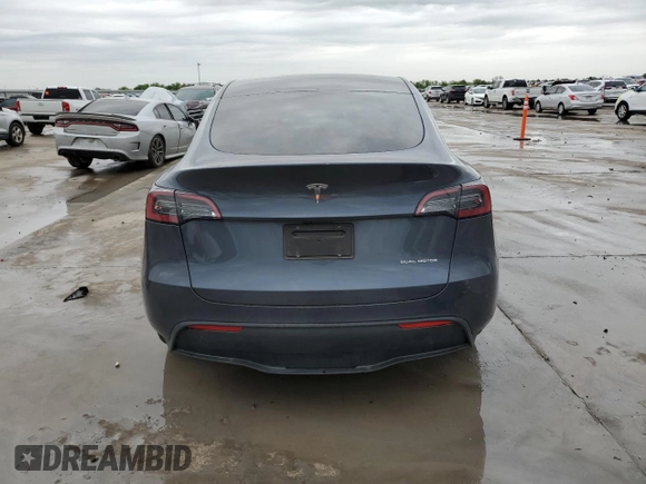 2023 Tesla Model Y Long Range with VIN 7SAYGDEE3PA151887, listed as a Copart auction lot 51459495 with 15,562 mi miles and Salvage Title. Bid and sale history available at DreamBid. Image 6.