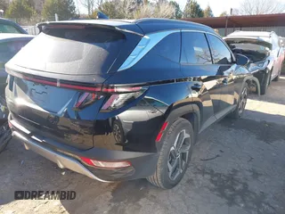 2022 Hyundai Tucson Limited with VIN 5NMJE3AEXNH001018, listed as a IAAI auction lot 41243221 with 81,590 mi miles. Bid and sale history available at carsss.com. Image 4.