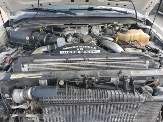 2009 Ford F-250 XL with VIN 1FTSW21R19EB22852, listed as a Copart auction lot 60052435 with 147,095 mi miles and Salvage title. Bid and sale history available at DreamBid. Image 11.