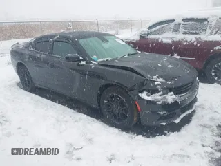 2015 Dodge Charger SXT with VIN 2C3CDXJG8FH746291, listed as a IAAI auction lot 41102488 with 189,971 mi miles. Bid and sale history available at carsss.com. Image 1.