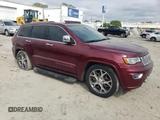 2020 Jeep Grand Cherokee Overland with VIN 1C4RJFCG9LC197270, listed as a Copart auction lot 53049795 with 29,437 mi miles and Salvage Title. Bid and sale history available at DreamBid. Image 4.