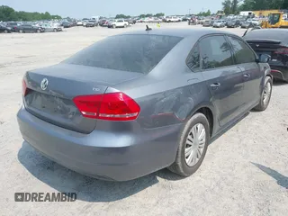 2014 Volkswagen Passat Wolfsburg Edition with VIN 1VWAS7A32EC070490, listed as a IAAI auction lot 42373146 with 53,706 mi miles and . Bid and sale history available at DreamBid. Image 4.