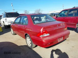 2002 Mitsubishi Lancer LS with VIN JA3AJ36E82U063279, listed as a IAAI auction lot 41711543 with 39,127 mi miles. Bid and sale history available at carsss.com. Image 3.