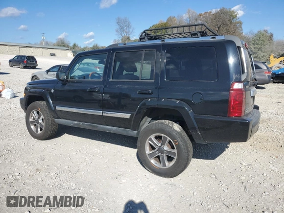 2007 Jeep Commander Overland with VIN 1J8HG68207C610814, listed as a Copart auction lot 41726555 with 211,502 mi miles and Salvage title. Bid and sale history available at DreamBid. Image 2.