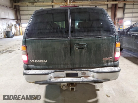 2001 GMC Yukon SLT with VIN 1GKEK13T61J193671, listed as a Copart auction lot 43572535 with 212,529 mi miles and Salvage Title. Bid and sale history available at carsss.com. Image 6.