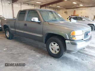 2002 GMC Sierra 1500 SLE with VIN 2GTEK19T821242433, listed as a IAAI auction lot 42257346 with 309,299 mi miles and . Bid and sale history available at DreamBid. Image 1.