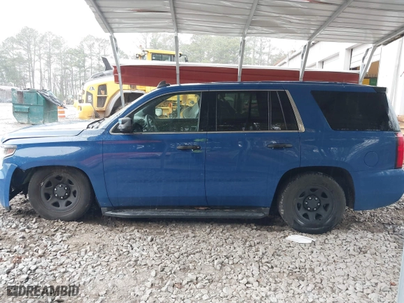 2015 Chevrolet Tahoe Commercial with VIN 1GNSK2EC1FR663199, listed as a IAAI auction lot 41552787 with 148,187 mi miles. Bid and sale history available at carsss.com. Image 14.