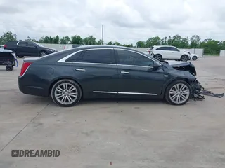 2019 Cadillac XTS Luxury with VIN 2G61M5S33K9113899, listed as a IAAI auction lot 42063952 with 148,773 mi miles and . Bid and sale history available at DreamBid. Image 12.