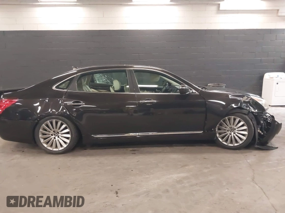 2015 Hyundai Equus Signature z VIN KMHGH4JH7FU100256, wystawiony jako IAAI lot #39882362 z przebiegiem 105 880 mil mil oraz . Historia ofert i sprzedaży dostępna na DreamBid. Obrazek 13.