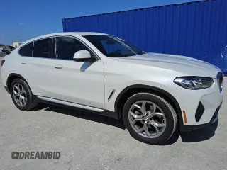 2024 BMW X4 xDrive30i z VIN 5UX33DT09R9W70709, wystawiony jako Copart lot #56997035 z przebiegiem 21 308 mil mil oraz Tytuł czysty. Historia ofert i sprzedaży dostępna na DreamBid. Obrazek 4.