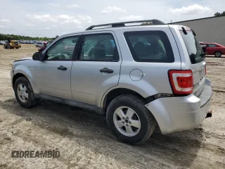 2010 Ford Escape XLS with VIN 1FMCU0C70AKB52226, listed as a Copart auction lot 58241455 with 237,785 mi miles and Salvage title. Bid and sale history available at DreamBid. Image 2.