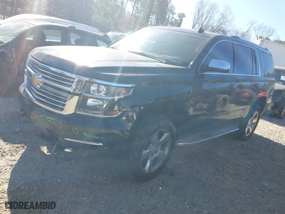 2015 Chevrolet Tahoe LTZ with VIN 1GNSKCKC3FR222135, listed as a IAAI auction lot 41816033 with 180,393 mi miles. Bid and sale history available at carsss.com. Image 17.