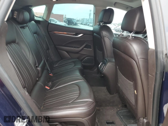 2017 Maserati Levante z VIN ZN661XULXHX239058, wystawiony jako Copart lot #79507514 z przebiegiem 79 180 mil mil oraz Czysty tytuł • Clean title. Historia ofert i sprzedaży dostępna na DreamBid. Obrazek 10.