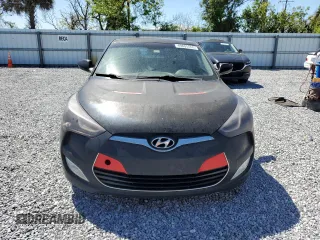 2013 Hyundai Veloster w/Black Int with VIN KMHTC6AD6DU107525, listed as a Copart auction lot 49805555 with 135,640 mi miles and Clean Title. Bid and sale history available at carsss.com. Image 5.