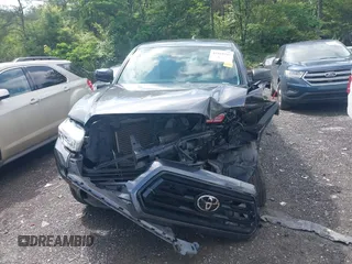 2020 Toyota Tacoma SR z VIN 5TFRZ5CN0LX088271, wystawiony jako IAAI lot #42169345 z przebiegiem 75 654 mil mil oraz . Historia ofert i sprzedaży dostępna na DreamBid. Obrazek 12.