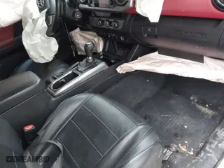 2018 Toyota Tacoma SR5 with VIN 3TMAZ5CN7JM053453, listed as a IAAI auction lot 41430111 with 128,149 mi miles. Bid and sale history available at carsss.com. Image 5.